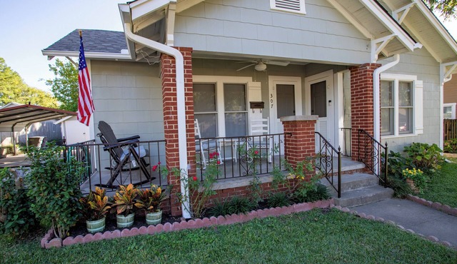 100yr home with peaceful 1940s vibe and modern amenities in historic downtown.