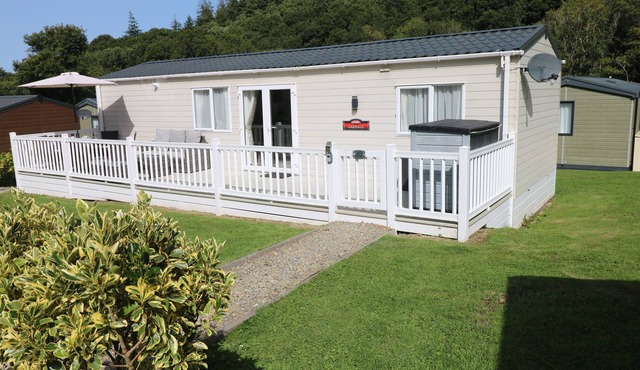 116 WOODPECKER LODGE, pet friendly in Llanarth
