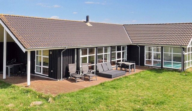 12 person holiday home in Pandrup-By Traum