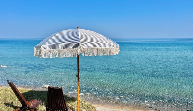 125 ft of Private BEACHFRONT with large, secluded yard & spectacular views!