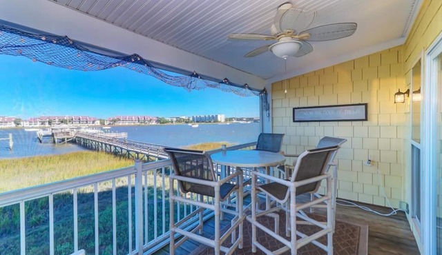 126 Waters Edge! Panoramic River Views, Large Screen Porch, Community Pool & Dock