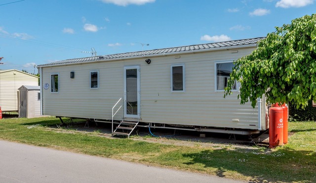 12ft-wide caravan with one double and two twin.
