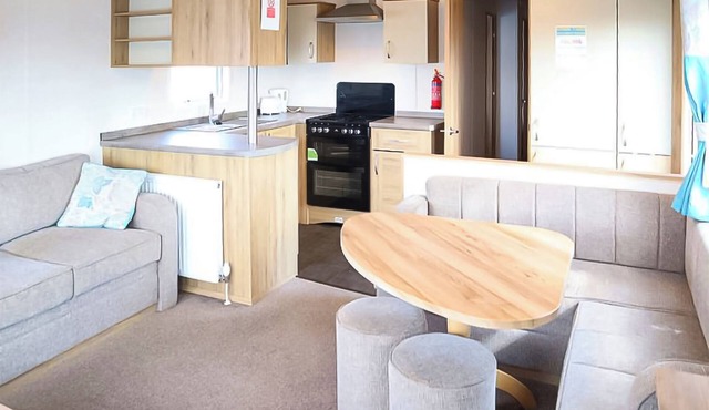 12ft-wide stylish and comfortable caravan with one double and two twin.