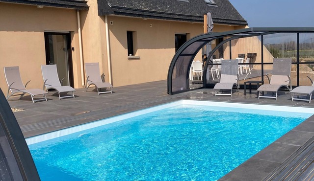 14-person villa with sea view and heated indoor pool.