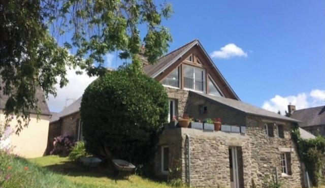 14th-century stone house facing Mont Saint Michel.
