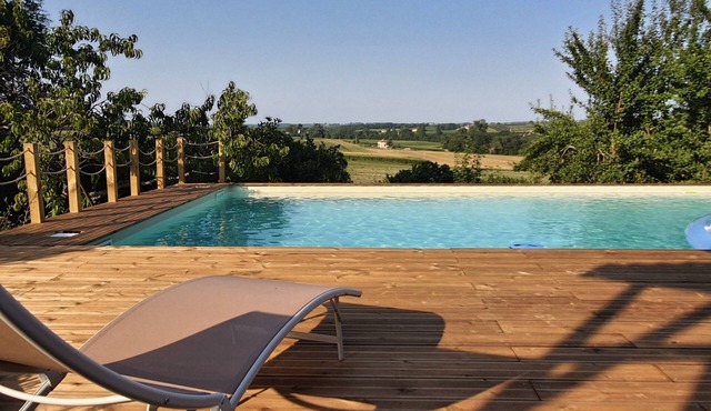 15th century house with swimming pool in the middle of orchards