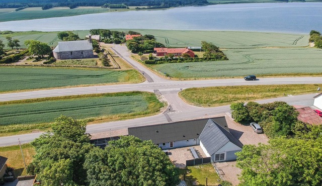 16-person holiday home with view over the water and wilderness bath.