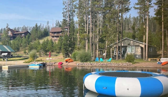 16 steps from lake porch to 70 ft of private beach, dock & shoreline.