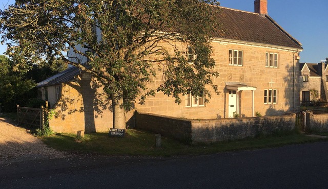 16thCentury cottage, foothills of Glastonbury Tor, outdoor pool.
