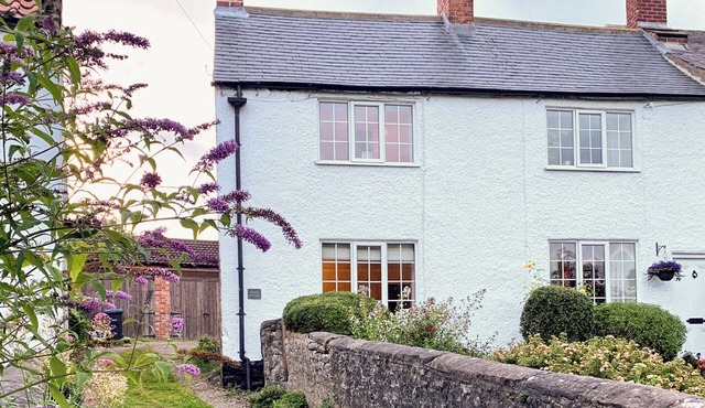 17th-century cottage overlooking village green.