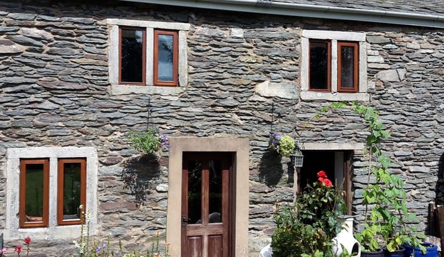 17th century Westmorland stone cottage retaining many original features. Haweswater and Ullswater La