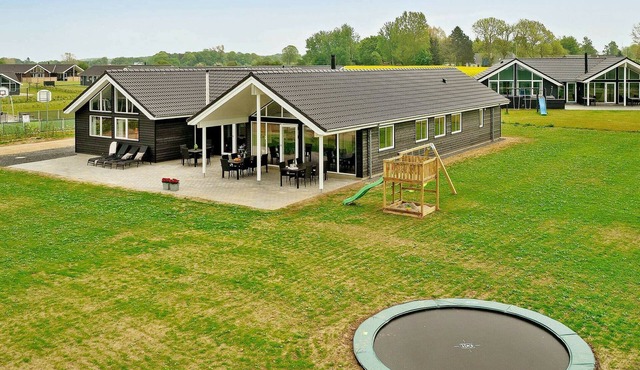 18 person holiday home in Bogense