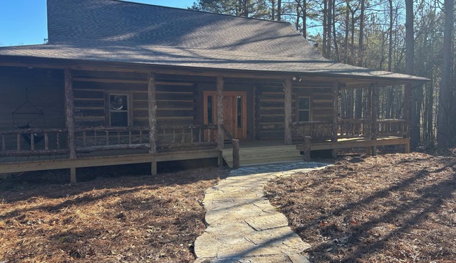 1850 log cabin with 2 br, 2 baths, W/D, mini split A/C, carport attached