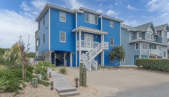 1861 - Into the Mystic, a spacious 6-bedroom oceanfront home in Corolla, NC.