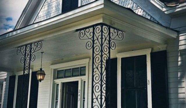 1880s country Victorian getaway with dark eclectic decor