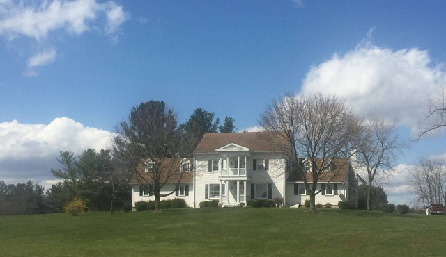 18th Century log Farm House in the heart of the Shenandoah wth all the comforts.