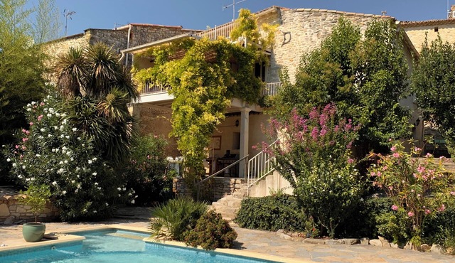 18th century village stone house, beautiful views, swimming pool, near Uzès