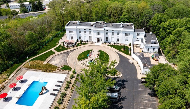 1917 Historical Mansion with Outdoor Pool on 5 acres in the middle of the city.