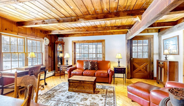 1970s acreage surrounded by trees with deck, grill, & internet