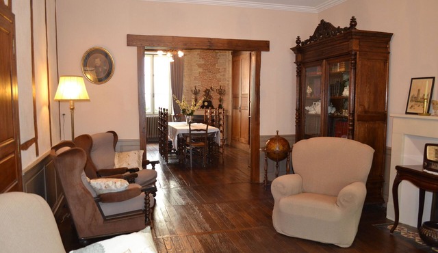 19th century bourgeois residence in the heart of the village, view of the Château de Verteuil