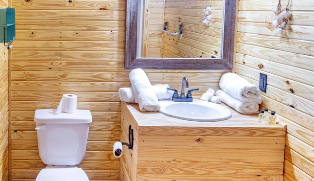 1bd rm, 1 bth, hotel style cabin w/Mini fridge, micro, & tv, at Kick Back Ranch