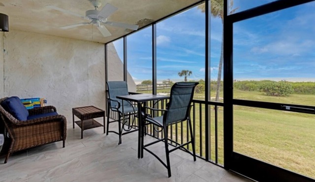 1st-Floor Oceanfront Corner Unit 2BR/2BA | Gulf Views | Large Lanai + Courtyard Patio | Walk to Beach in seconds!