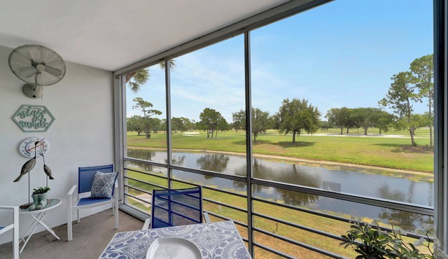 2/2 CONDO WITH AMAZING GOLF COURSE & WATER VIEWS FROM THE LANAI - DON'T MISS IT