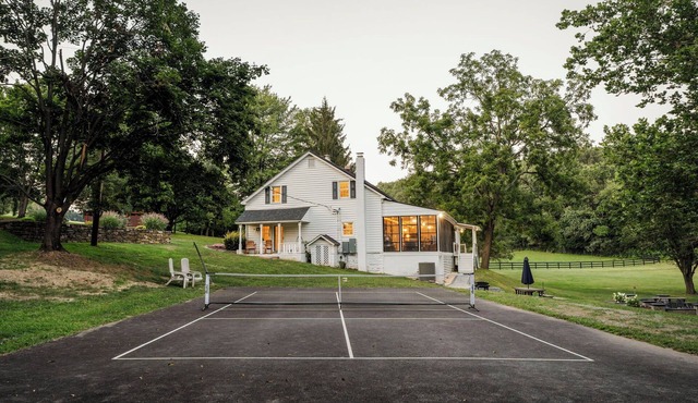 2.5 hours from Washington D.C. this spacious 5BR 2.5BA farmhouse is on a secluded 75-acre property near Manchester, MD, in scenic Carroll County. It promises a relaxing retreat near the state line, exciting local attractions, and natural landmarks.