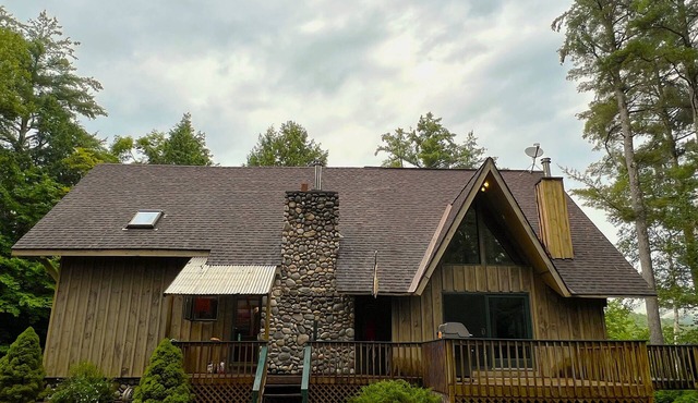2 Adirondack houses. 40 acres with gazebo and lake. 9 total bedrooms, Sleeps 20