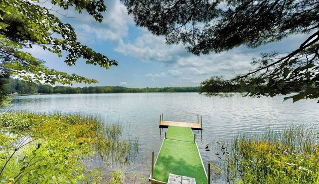 2 beautifully designed, off-the-grid homes with amazing lakefront views & access