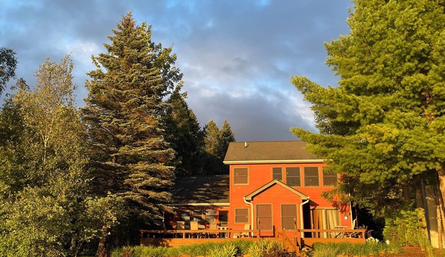 2+ Bed East Torch Lake with Rare Sandy Beach Frontage