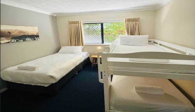 2-Bed Family Haven with Pools, BBQ & Playgrounds