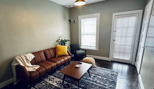 2-bedroom apartment in downtown Elkins with AC, a balcony, and WiFi.