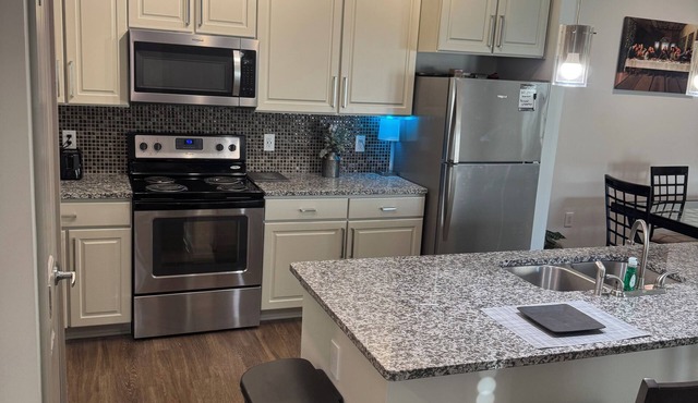 2-bedroom Apt, sits in the middle of a major shopping center and movie theater.