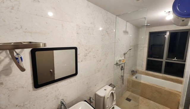 2-bedroom condo with AC, fitness room in enchanting Taman Melaka Raya