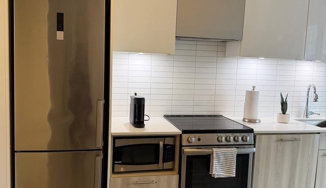 2-bedroom condo in peaceful Toronto with AC and comfort