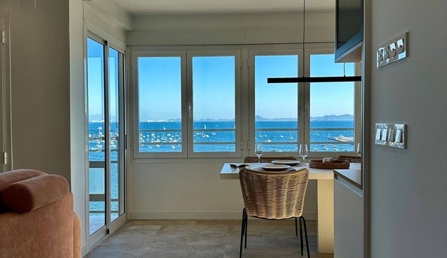 2-bedroom apartment in ocean view setting with AC and free parking.