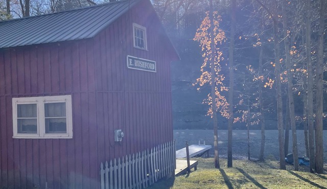 2-bedroom lakefront cottage on Rushford Lake with private dock.