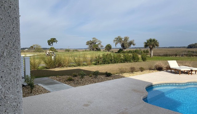 2 BEDROOM SUITE (SEPARATE FROM MAIN HOUSE) POOL, MARSH, GOLF AND WATER VIEWS