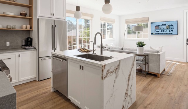 2 Bedroom Suite with Private Yard & Off-Street Parking. Full kitchen & living.