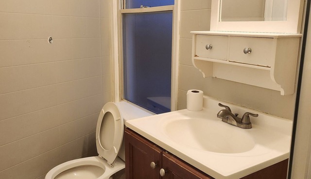 2-bedroom townhome in superb Baltimore with parking and gated yard