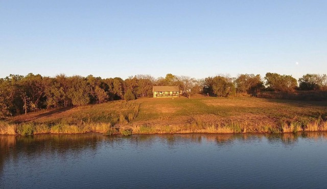 2-bedroom vacation home sitting on your own private lake for fishing/relaxing.