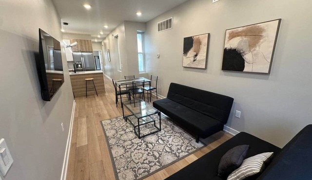 2 bedroom with back yard walk to city.