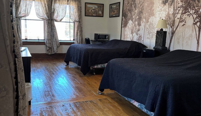 2 Comfortable Queen Beds, Hot Shower & an affordable price!