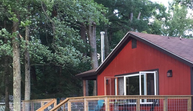 2 cottages on Whalen lake/ Baldwin MI Sleeps 12. Steps from sandy beach