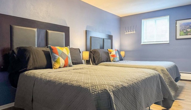 2 Full Apartments, 4 Bedrooms, 12 Beds + Parking