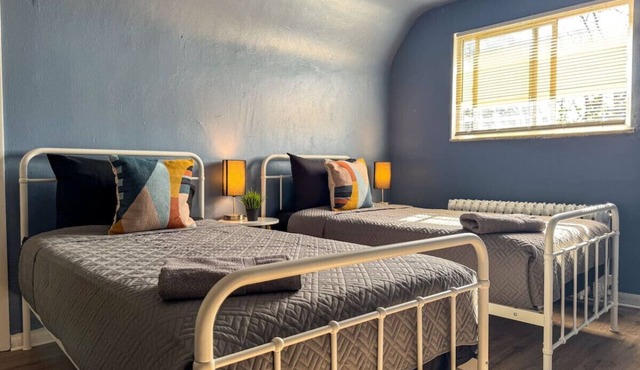 2 Full Apartments! 4 Bedrooms w/14 beds & Parking