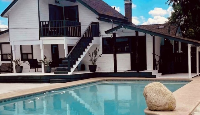 2 Homes 1 Property. 5 BR 3 BA POOL! Plenty of parking.