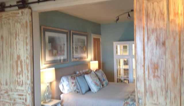2 level, 2 bedroom/2 bath filled with windows framing amazing water views!