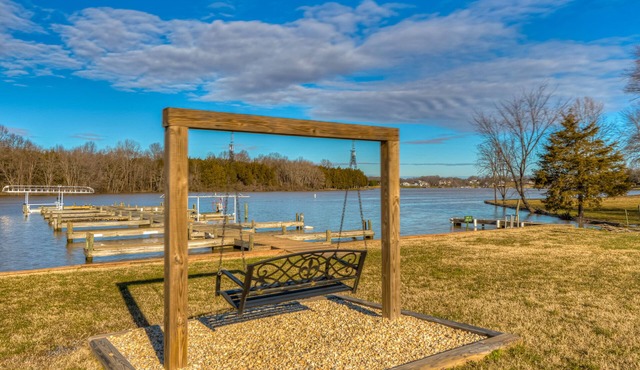 2-level home with gated community water access/boat launch, firepit, & game room